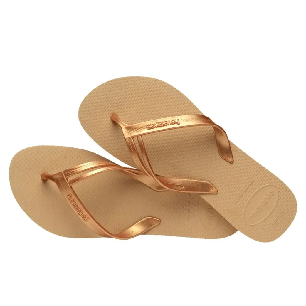 Chinelo feminino Havaianas Elegance dourado vista lateral mostrando tiras finas